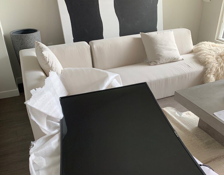 Melrose Moving crew loading boxes into truck in Pomona, CA